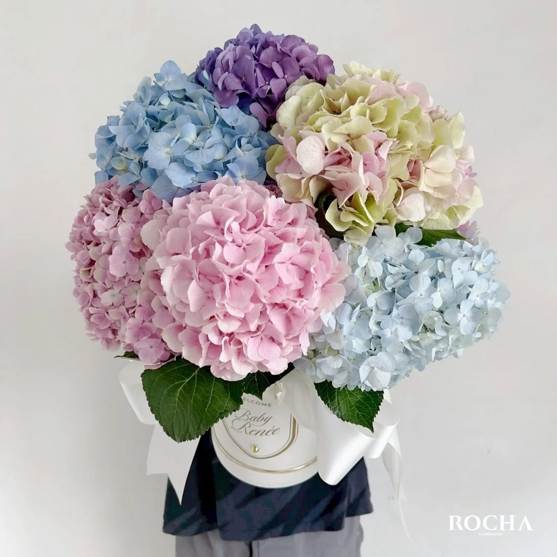 Oversized pastel hydrangea bouquet in an ivory box